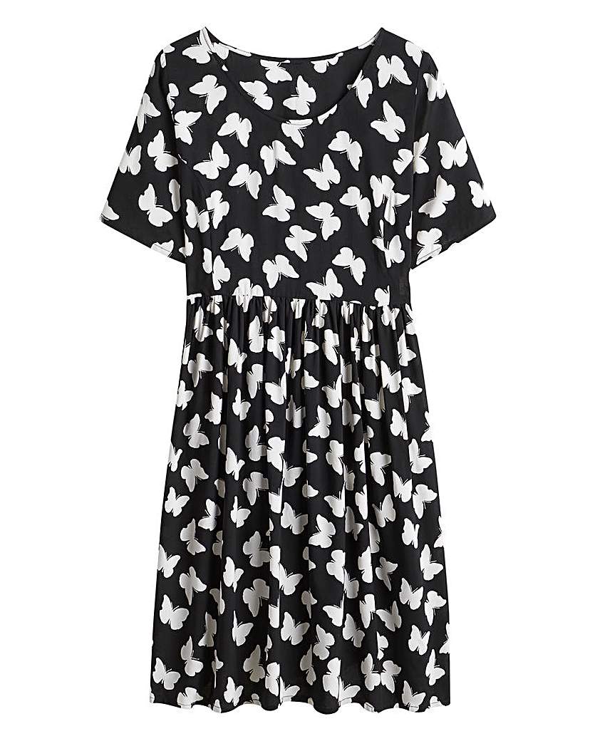 Butterfly Short Sleeve Babydoll Dress at Ambrose Wilson Catalogue Butterfly Short Sleeve Babydoll Dress.