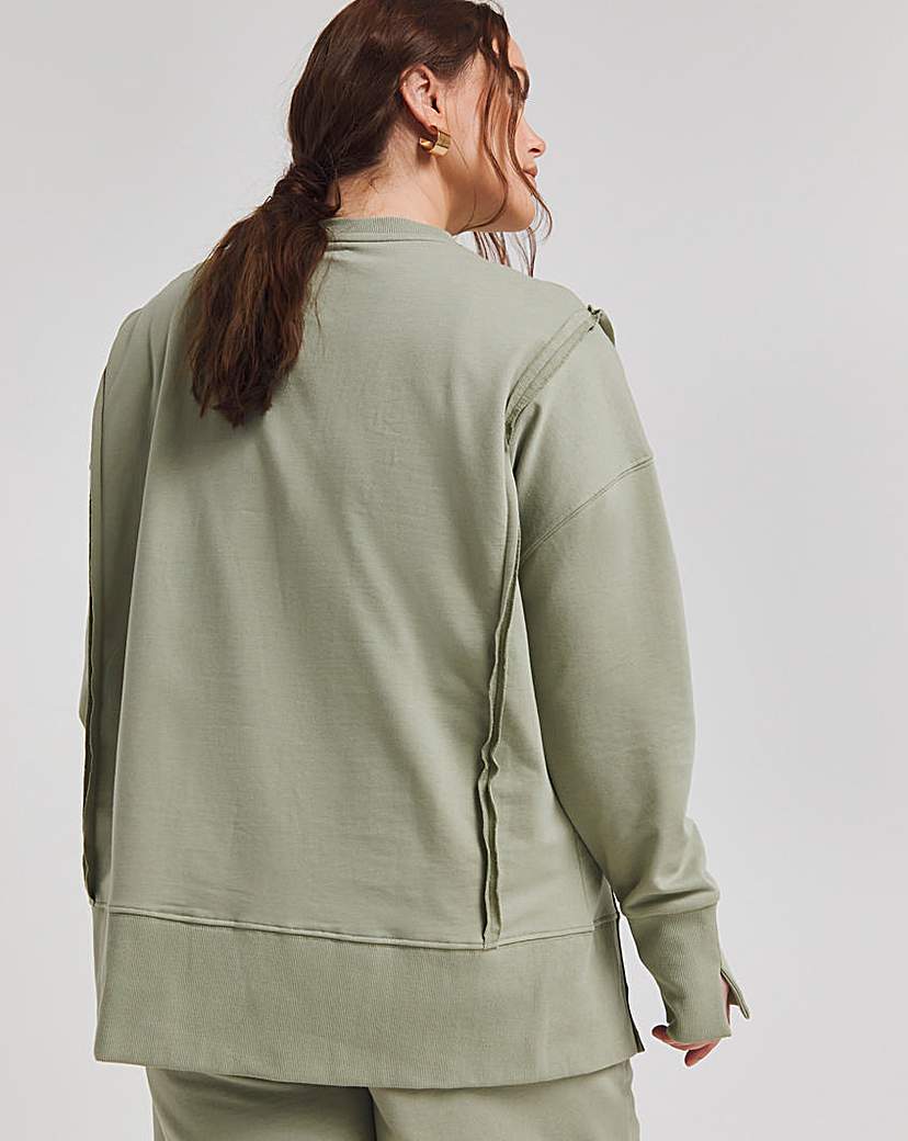 Exposed Seam Dip Back Sweatshirt