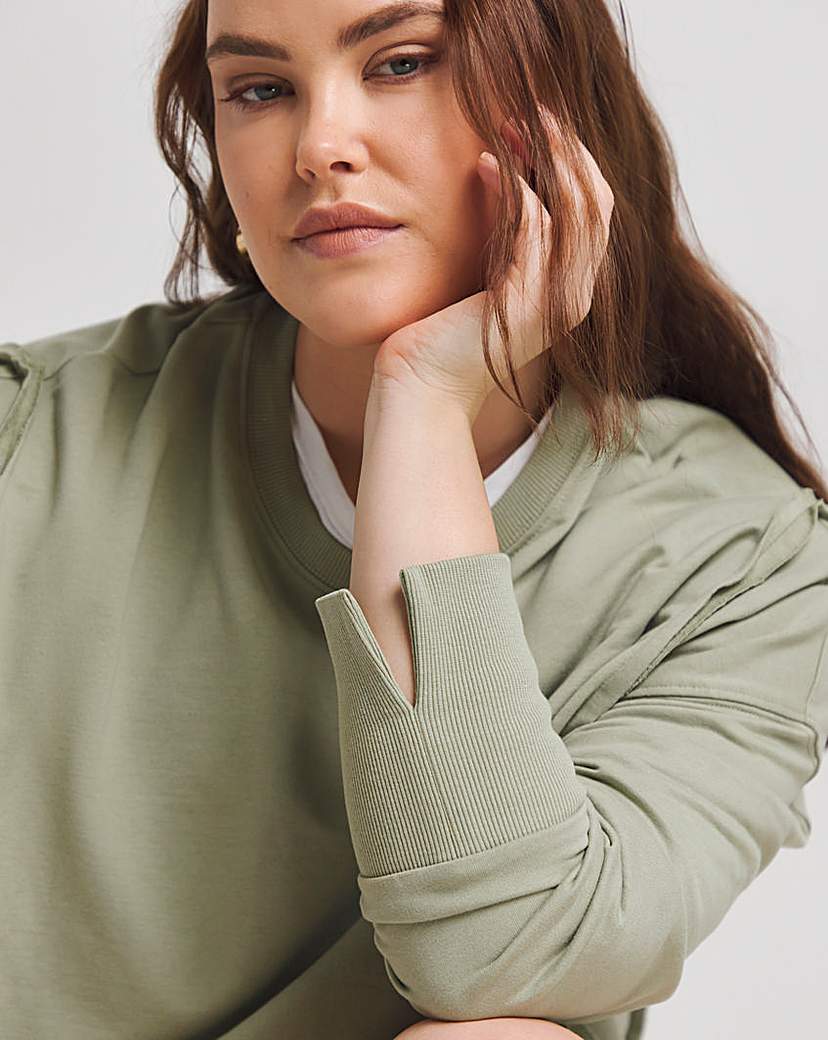 Exposed Seam Dip Back Sweatshirt