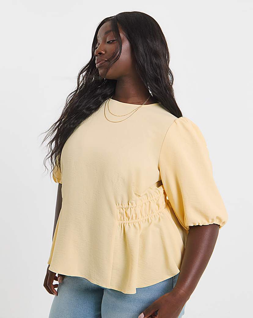 New In - Puff Sleeve Peplum Blouse