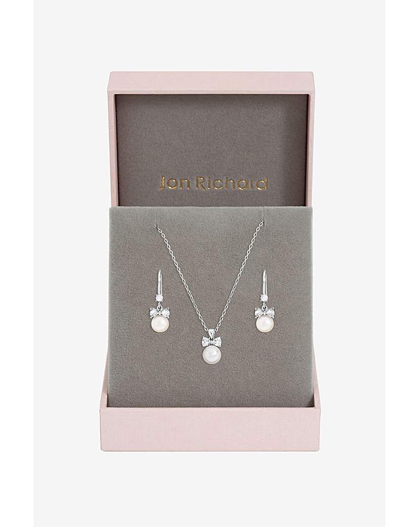 New In - Rhodium Plated Crystal Bow Pearl Set
