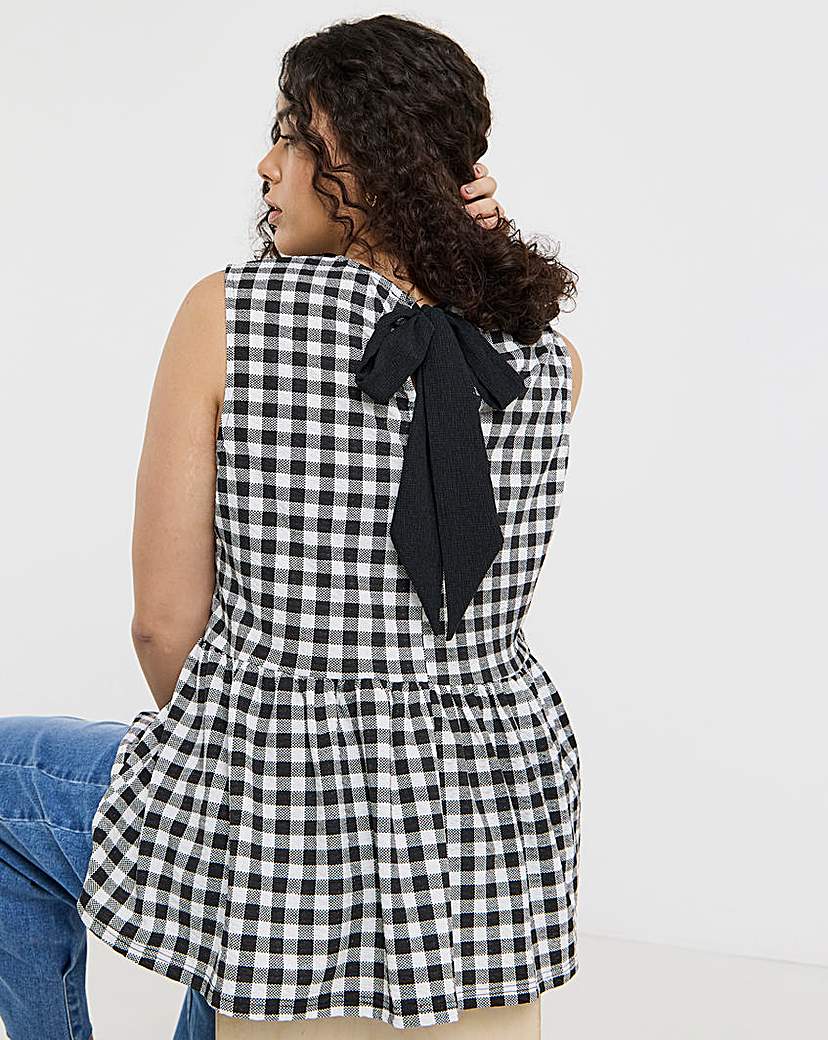 New In - Peplum Bow Back Top