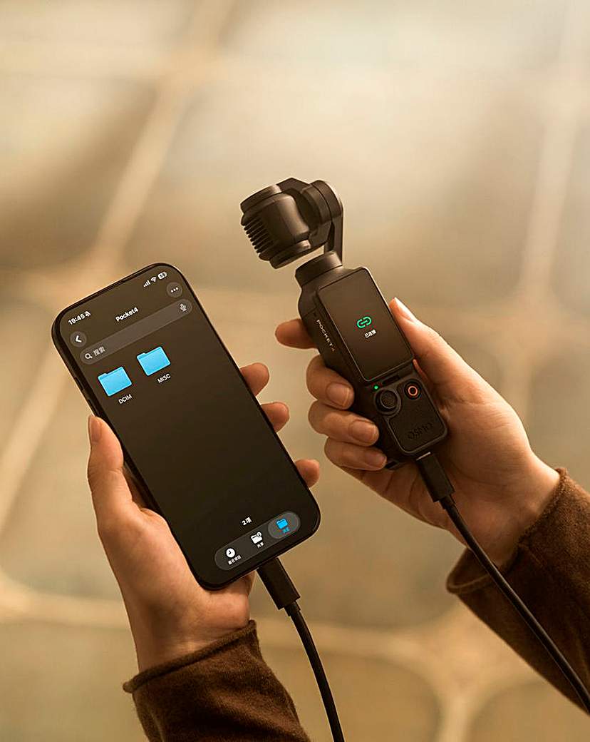View 4 of DJI Osmo Pocket 4 Creator Combo