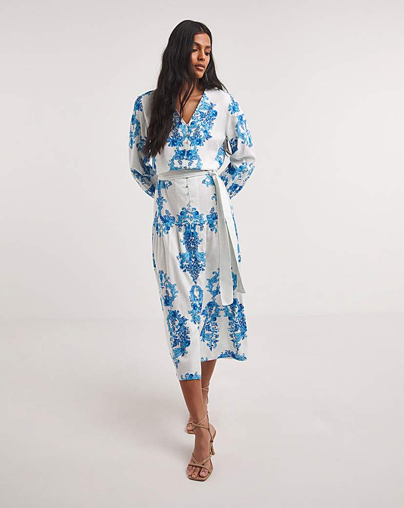 Raishma Studio V-Neck Midi Dress